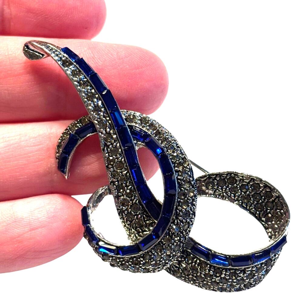 Rhinestone brooch clear white & cobalt blue crystals on silver swirl setting